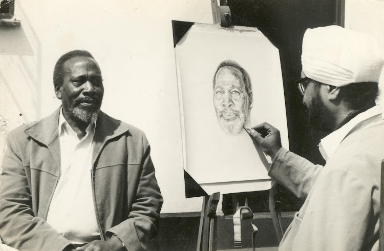 The late Dial Singh Sagoo drawing a portrait of the late Mzee Jomo Kenyatta.