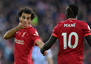 Mohamed Salah of Liverpool with teammate Sadio Mane during a Premier League match against Brighton at Anfield in October. The two will square off when Egypt meet Senegal in the 2021 Africa Cup of Nations final.