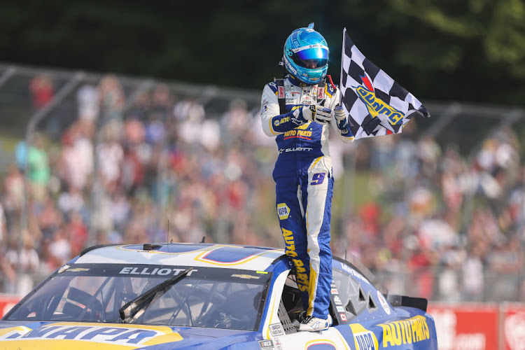 Chase Elliott celebrates after winning the NASCAR Cup Series Jockey Made in America 250 Presented by Kwik Trip at Road America on July 4 2021 in Elkhart Lake, Wisconsin.