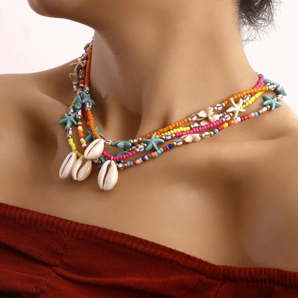 Bohemian kleurkralen zeester schelp hanger ketting voor vrouwen, een stijlvolle zomerse accessoire om je outfit compleet te maken.