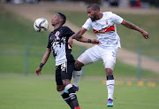 Raymond Daniels of Hungry Lions is challenged by Siyanda Msani of University of Pretoria in Tuks' final game of the 2021-22 GladAfrica Championship, where the Tswhane team finished second.