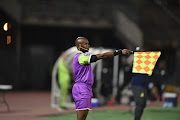 Assistant referee Zakhele Siwela during the MTN 8, quarter final match between Mamelodi Sundowns and Bloemfontein Celtic at Lucas Moripe Stadium on August 17, 2019 in Pretoria, South Africa. 