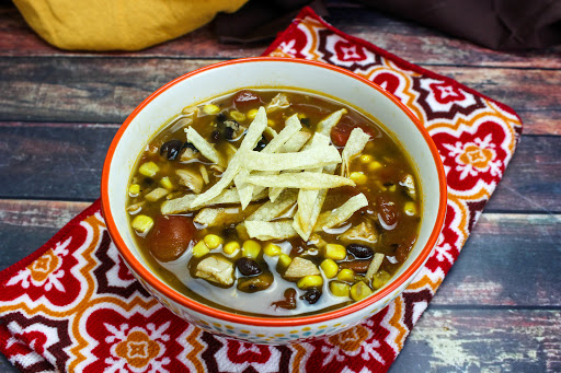 A bowl of Instant Pot Mexican Chicken Tortilla Soup.