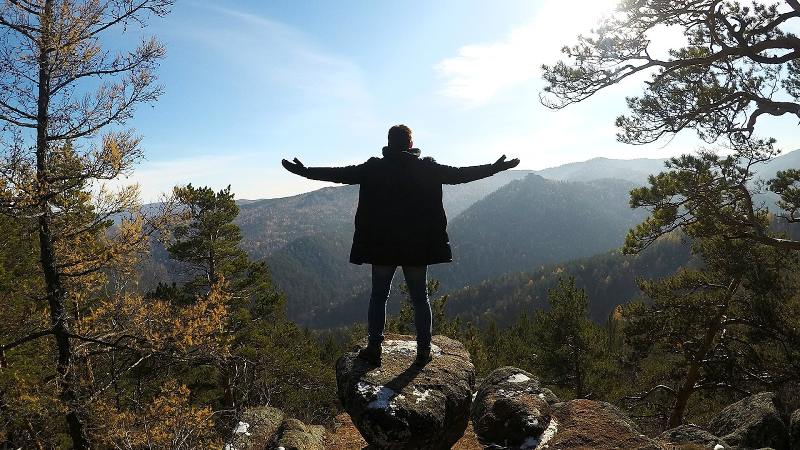 Traveler in Russian mountains