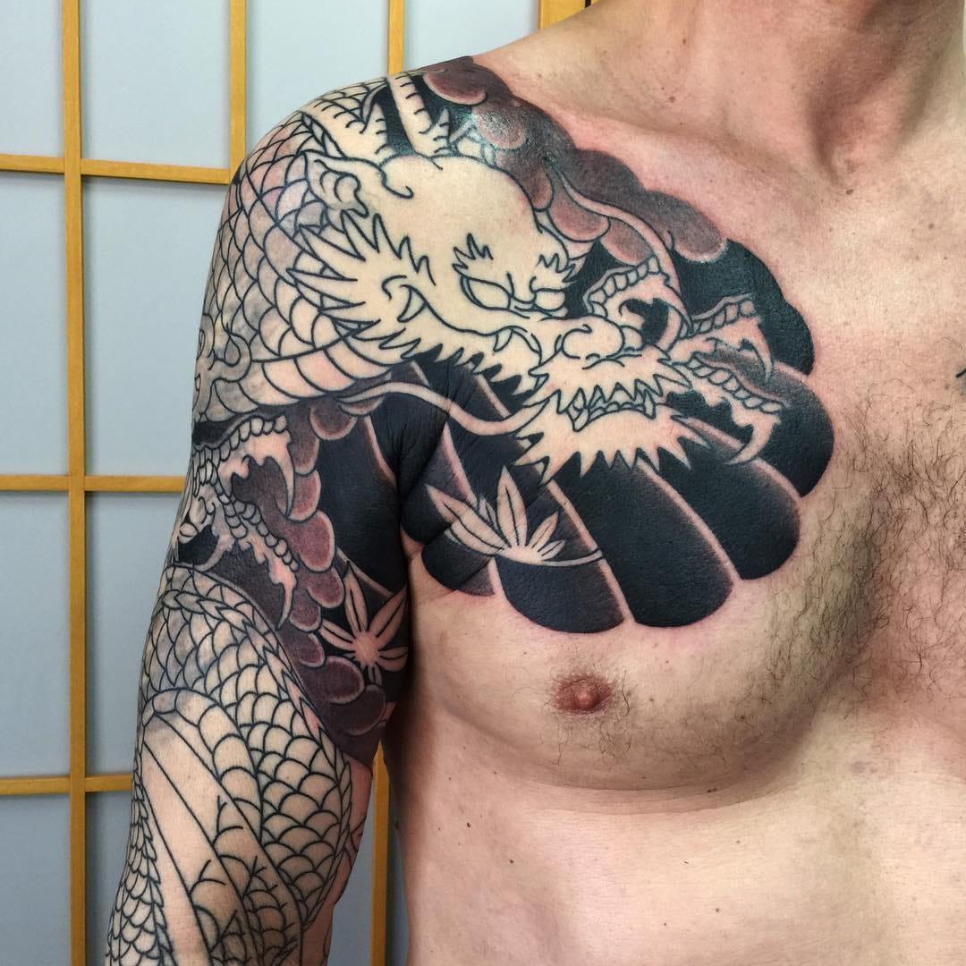 Tattoo uploaded by Justine Morrow • Tattoo by Sergey Buslay #SergeyBuslay  #tattoodoambassador #Japanese #irezumi #dragon #chestpiece #mapleleaves  #coveruptattoo #coverup #clouds #leaves #mythicalcreature #folklore •  Tattoodo