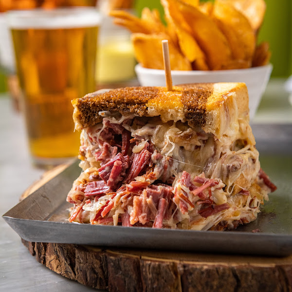 hi, my name is Reuben | 
crunchy, buttery marble rye | gooey Swiss |
slowly simmered, extra lean corned beef, chopped
& not sliced (believe us, that matters!) | 1,000 island |
classic sauerkraut