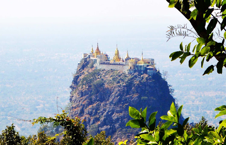 Mt. Popa, a Buddhist monastery, is perched at the summit of Taung Kala in Myanmar. It's a 777-step climb to the top. 