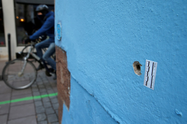 The impact from a bullet is seen on a wall on the rue du Savon after the deadly shooting in Strasbourg, France, on December 13 2018.