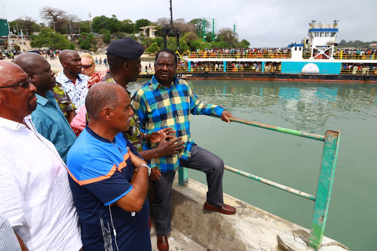 AU envoy Raila Odinga when he was briefed by operation commander Lawrance Gituma at the Likoni ferry on Saturday, October 5, 2019.