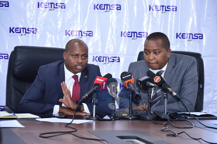 Acting CEO Andrew Mulwa(left) and Board Chairman Kenya Medical Supplies Authority Irungu Nyakera addressing the media during KEMSA turnaround status update for the last ten months at National Supply Chain Centre in Embakasi Nairobi on February 21,2024
