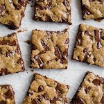 Gooey Chocolate Chunk Blondies was pinched from <a href="https://www.handletheheat.com/gooey-chocolate-chunk-blondies/" target="_blank">www.handletheheat.com.</a>