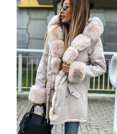 Title 4, Womens winter mid-length coat featuring a thic...