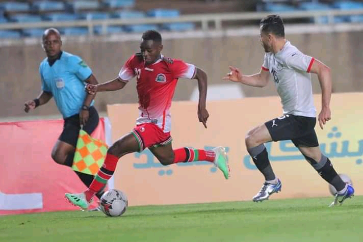 Kenya's Dan Sakari outpaces an opponent during their African Cup of Nations qualifiers against Egypt at Moi Stadium Kasarani.