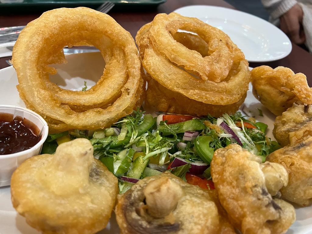 Gluten free onions rings and battered mushrooms