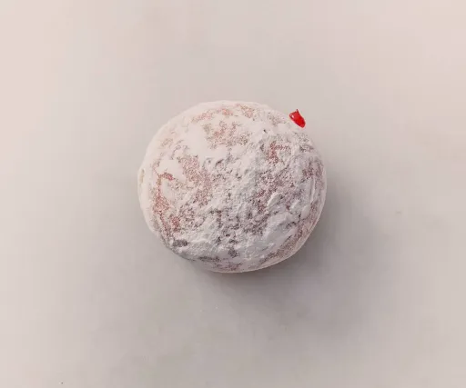 Powdered Strawberry Filled Doughnut