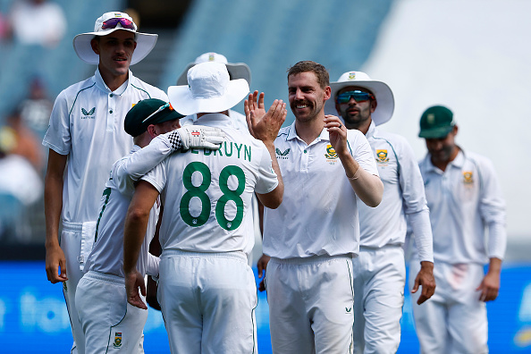 South Africa's fast bowler Anrich Nortje celebrates after Steve Smith of Australia was caught by Theunis de Bruyn during day 2 of the second Test between Australia and the Proteas at Melbourne Cricket Ground on December 27 2022.