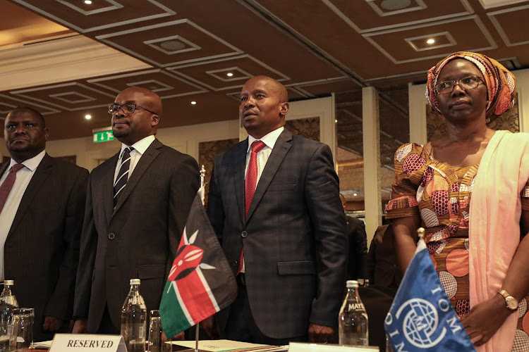 Interior Principal Secretary Raymond Omollo with Interior Cabinet Secretary Kithure Kindiki during the inaugural National Border Management Conference at Kempinski in Nairobi on April 2, 2024.