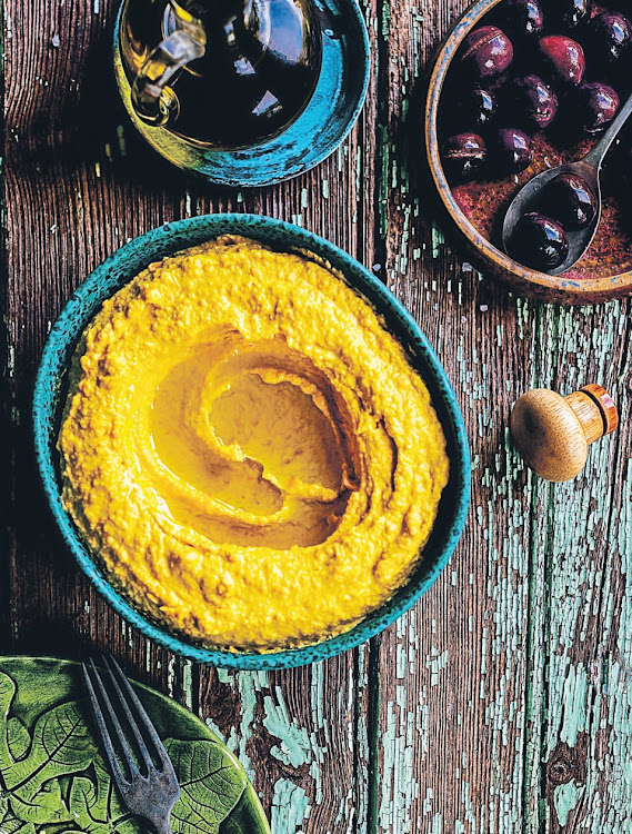 Hummus is a quintessential part of Lebanese mezze. Pictured here is the roasted carrot hummus from Lindop's new book.