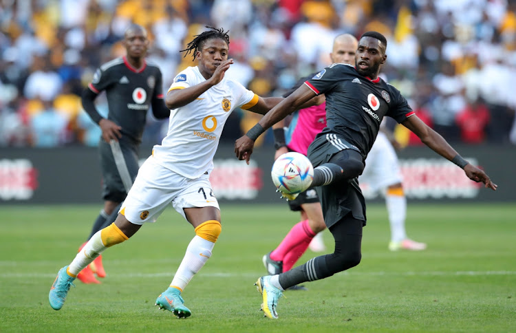 Fortune Makaringe of Orlando Pirates challenged by Kgaogelo Sekgota of Kaizer Chiefs during the DStv Premiership 2022/23 match between Orlando Pirates and Kaizer Chiefs at FNB Stadium.