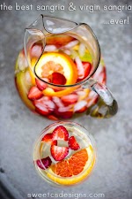 The Tastiest (& easiest) White Sangria & Virgin Sangria Recipe was pinched from <a href="http://sweetcsdesigns.com/the-tastiest-easiest-white-sangria-virgin-sangria-and-a-huge-giveaway/" target="_blank">sweetcsdesigns.com.</a>