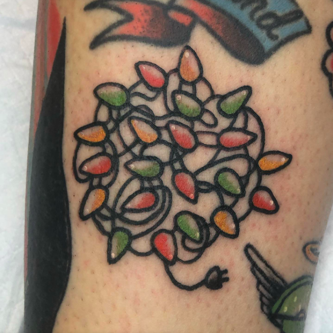 Mesh Of Christmas Lights Tattoo