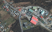 A satellite image shows people and vehicles waiting to cross into Slovakia from Ukraine, at the Vysne Nemecke border crossing, Vysne Nemecke, Slovakia, February 28, 2022. 