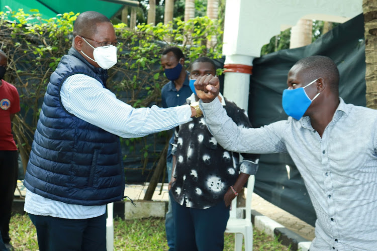 Kilifi Senator Stewart Madzayo with supporters at his Mtwapa residence on Sunday, July 26.