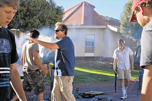 Tim Greene directs a scene from the movie 'Skeem'