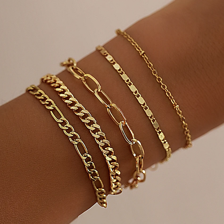 Bracelet chaîne croisée double simple pour femmes Élégance et raffinement au quotidien. Ce bijou délicat rehausse votre style et convient à toutes les tenues.