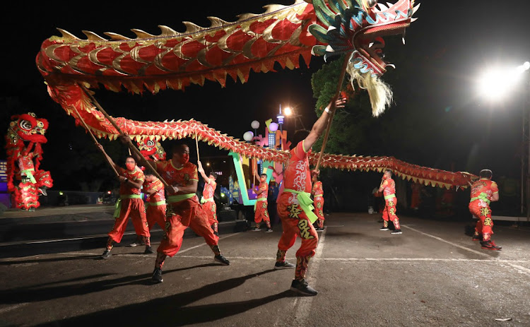 The Chinese community of Cape Town perform a dragon dance during the Cape Town Carnival.