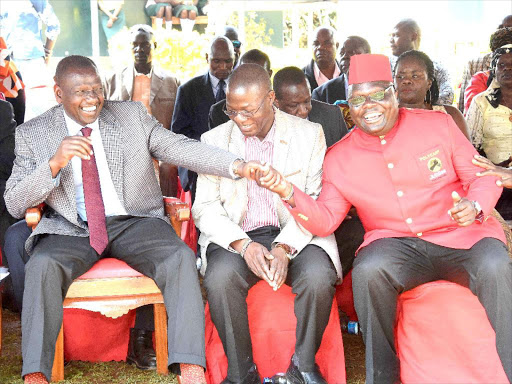 DeputyPresidentWilliam Ruto, JPBusia governoraspirant DanielOnyangoand MatayosconstituencycandidatePolycarpOnyango inBusia yesterday/ REBECCA NDUKU/DPPS