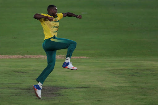 South African Lungi Ngidi celebrates the dismissal of Sri Lanka's Batsman Kusal Mendis (not in picture) during the first T20 match between South Africa and Sri Lanka on January 20, 2017 at Supersport park in Centurion, South Africa. GIANLUIGI GUERCIA / AFP