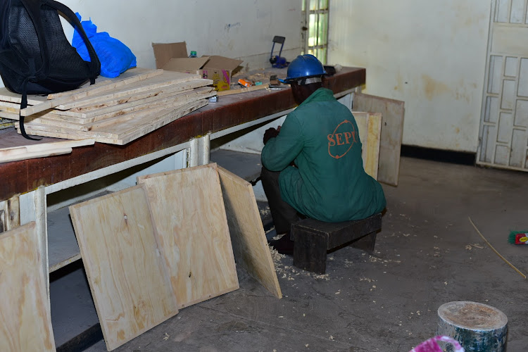 On going modification of Grade 7 Laboratory by carpenter Patrick Musyoka at Muguga Green School Primary and Junior Secondary in Westlands on February,27 2023/KEITH MUSEKE