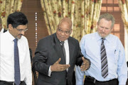 MAKING A POINT: President Jacob Zuma arrives at the Broad-Based Black Economic Empowerment  Council meeting held at his residence, Mahlamba Ndlopfu in Pretoria yesterday. He is flanked by Economic Development Minister Ebrahim Patel, left, and Trade and Industry Minister Rob Davis.  Photo: Ntswe Mokoena