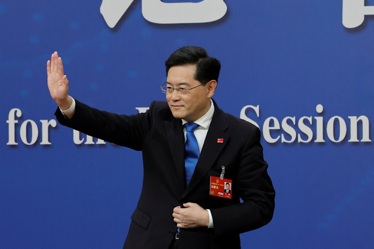 Chinese foreign minister Qin Gang waves at the end of a news conference on the sidelines of the National People's Congress in Beijing, China, March 7 2023. Picture: THOMAS PETER/ REUTERS