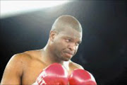 MEAN: Osborne Machimana never raised a sweat agaist Corrie Sanders. PIc. Antonio Muchave. 03/02/08. © Sowetan.