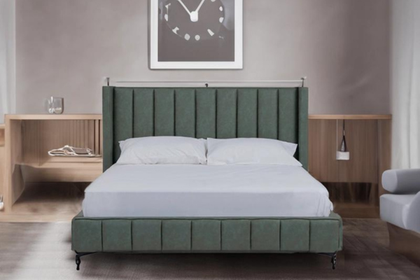 Dark green divan queen bed frame upholstered in fabric, featuring headboard and sturdy metal legs.