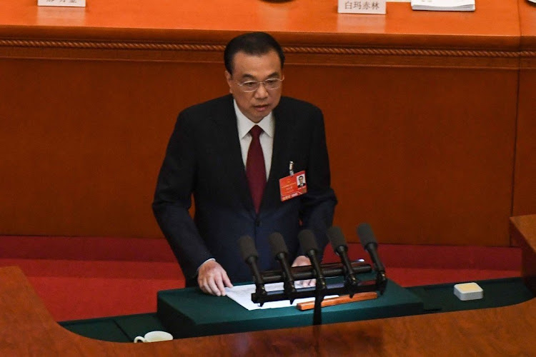 On Saturday, Premier Li Keqiang read out the government report to the assembled thousands of delegates for their deliberation and approval.