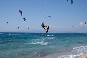 People kite surf at Mylos beach, following the easing of measures against the spread of the coronavirus disease (Covid-19), on the island of Lefkada, Greece. File photo