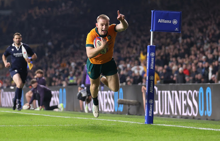 Max Jorgensen of Australia scores his team's fifth try in their Autumn Nations Series win against England at Twickenham in London on Saturday night.