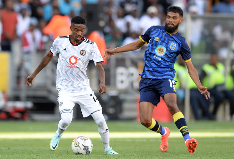 Orlando Pirates midfielder Monnapule Saleng battle for the ball with Keanu Cupido of Cape Town City during their DStv Premiership match at at Cape Town Stadium on 7 January 2023.