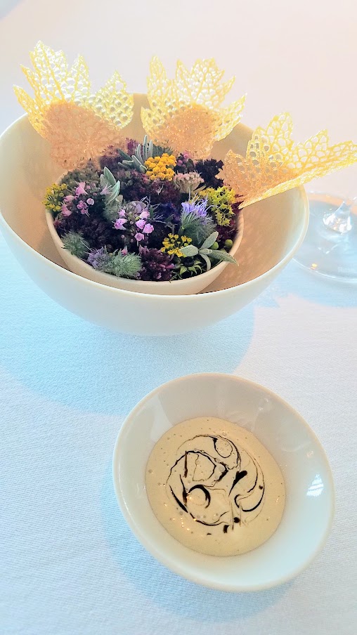 Snack of Crispy Leaves, Walnut Oil, and Pickled Walnut Leaves at Geranium, a three Michelin star restaurant in Copenhagen