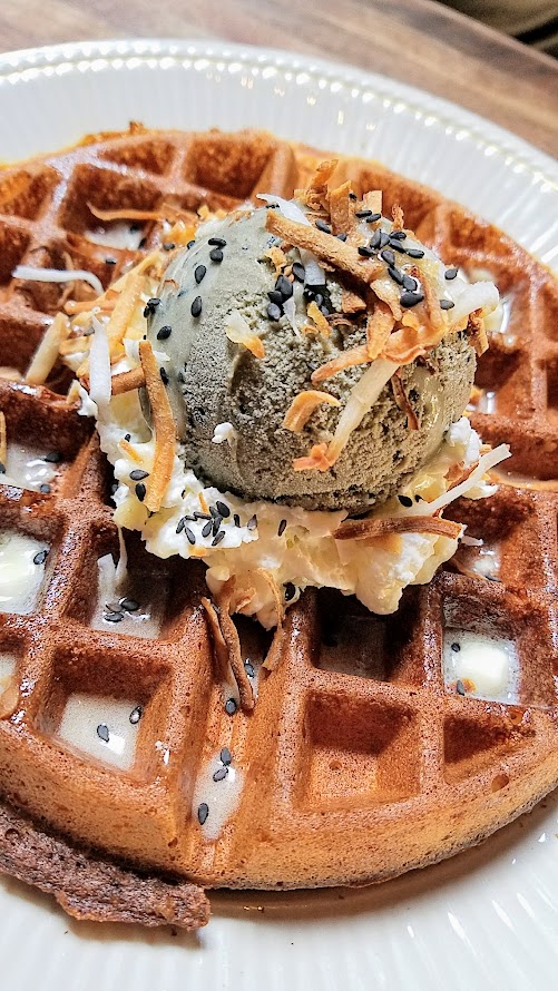 Expatriate Brunch, Rice Waffle with Black Sesame Ice Cream</strong> made with heirloom carolina rice flour, coconut glaze, local honey