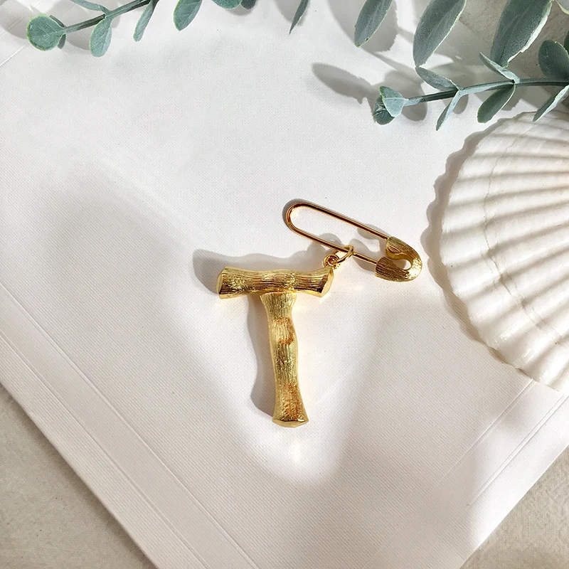 Creative and fashionable 26 English Letter Brooches to personalize your style. Add a unique, elegant touch to any outfit