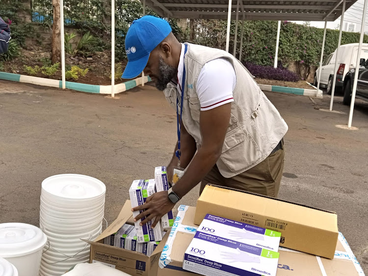 Mony Marcel from UNICEF packs some of the medical equipment destined to the Asal counties counties to mitigate cholera response at Afya house on Tuesday, January 24, 2023