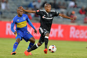 Thabo Matlaba of Orlando Pirates and Bongolethu Jayiya of Cape Town City during the Absa Premiership match between Orlando Pirates and Cape Town City at Orlando Stadium on September 20, 2016 in Soweto, South Africa.