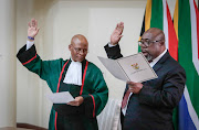 Chief Justice Mogoeng Mogoeng swears in Thulas Nxesi as Minister of Employment and Labour.