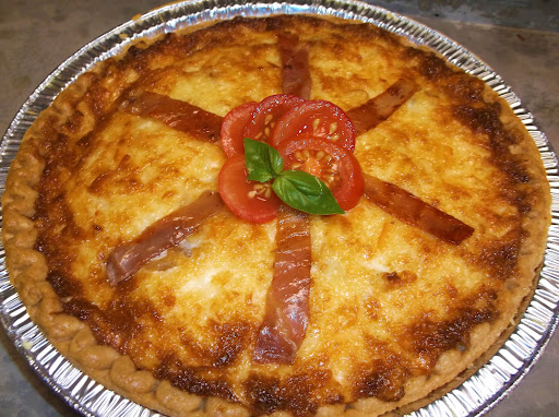 Tomato pie with an Italian twist ready to serve.