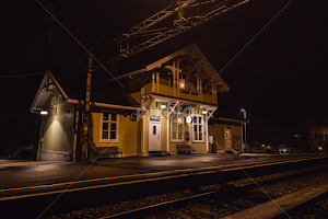 Fetsund trainstation by Jon Eggen -   ( fetsund, konsvingerbanen, wet, akershus, norge, building, tracks, fet, light, dark, norway, fetsund trainstaion, schirmer & von hanno, late night )