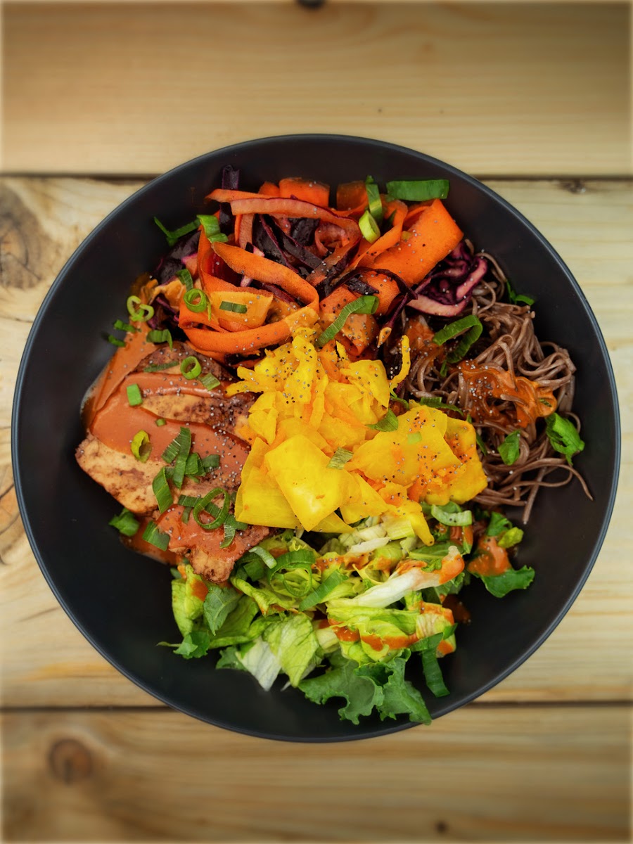 Our top selling bowl is the Spicy Tofu + Soba Noodle Bowl made with 100% organic buckwheat soba noodles, our in-house ginger tumeric kimchi, organic kale, and topped with peanut satay dressing. Naturally gluten-free and 100% delicious.